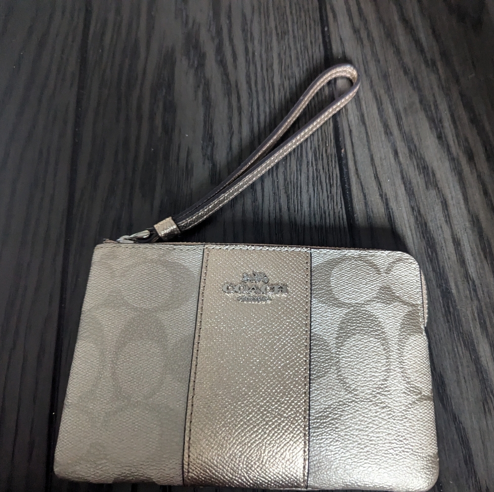 Coach gold and silver wristlet